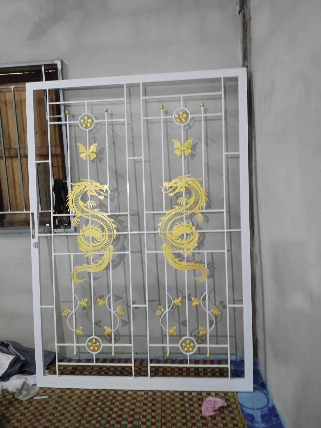 เหล็กดัดลายมังกรทองบานเดี่ยว